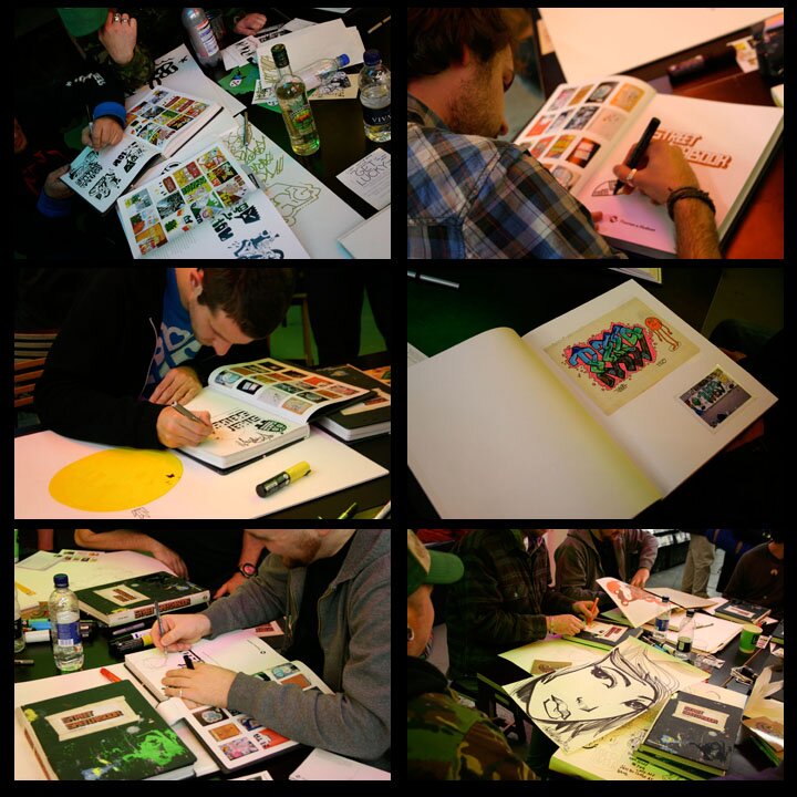 Images of artists signing books